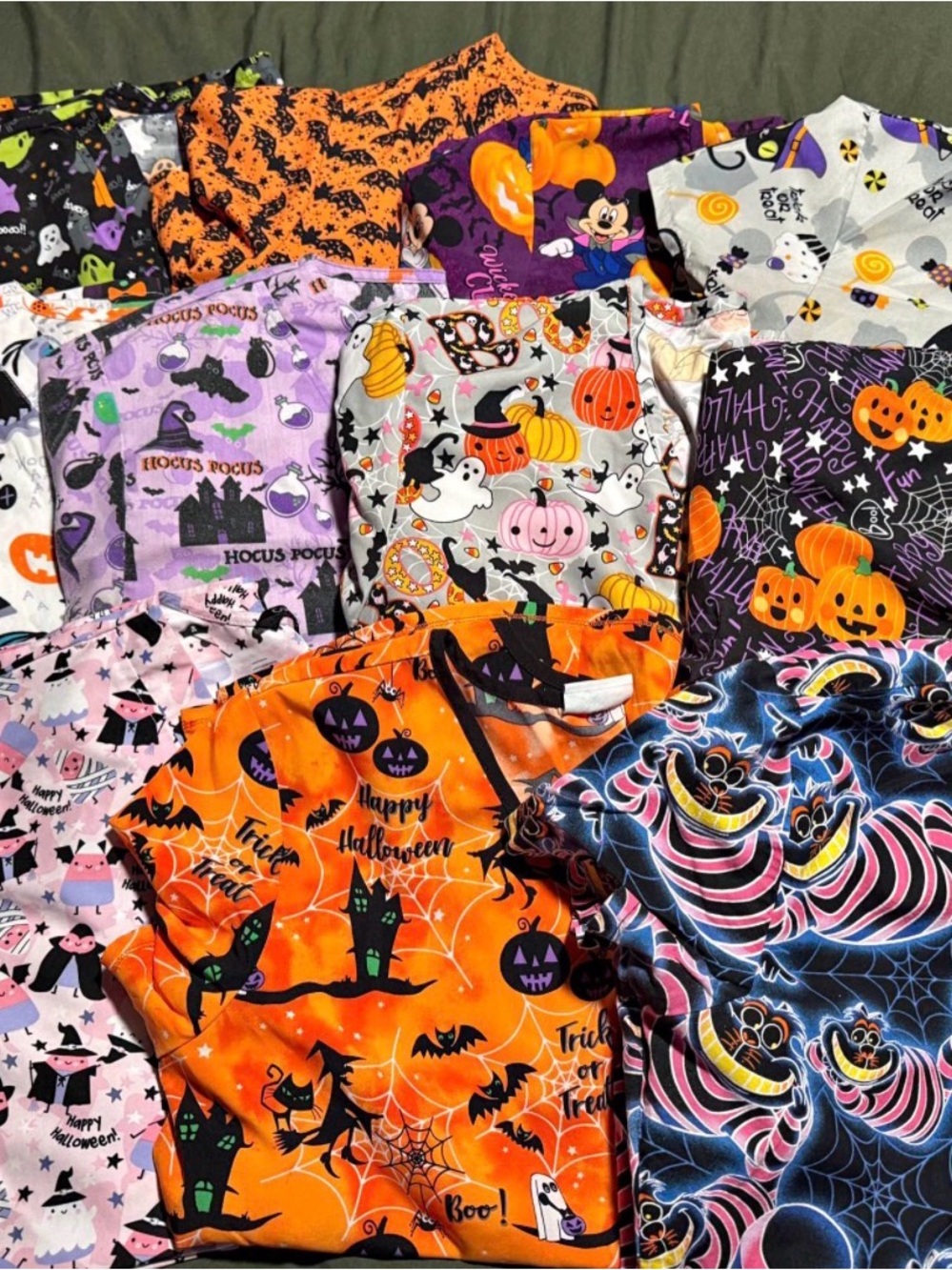 11 large Woman’s Halloween scrub tops.